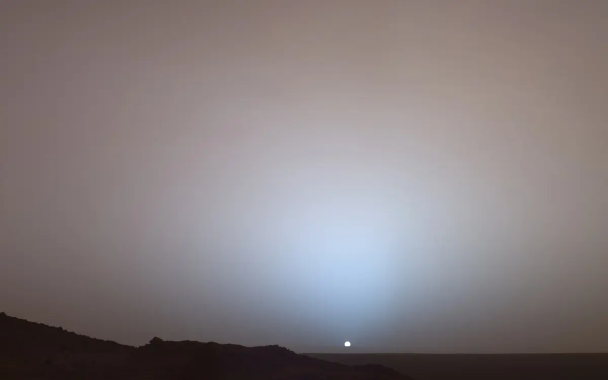 Blue sunset over the Martian horizon photographed by a NASA rover